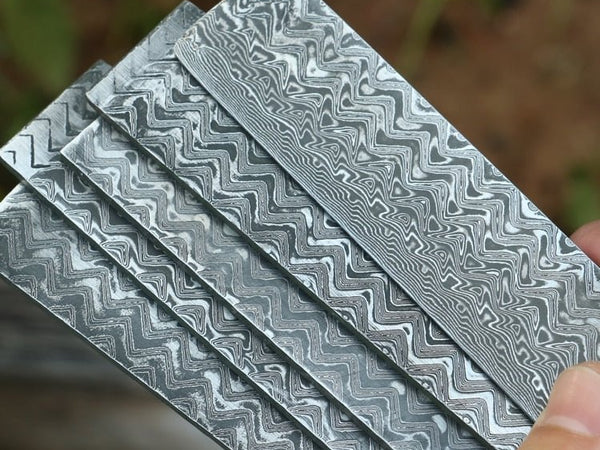 Herringbone damascus pattern on a forged steel blade, one of 19 damascus pattern types