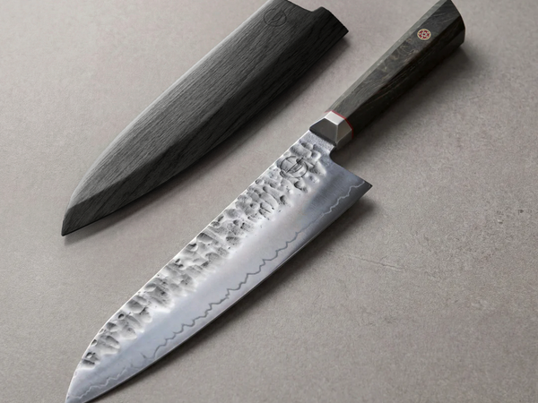 Bara Forge 8-inch chef knife with a 10Cr17MoV steel core at 60 HRC and a stabilized burl wood handle