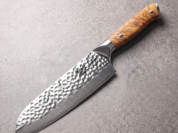 Hand-hammered Damascus santoku knife with sheep's foot blade profile