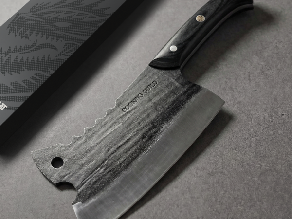 Heavy duty meat cleaver with a thick spine and full tang handle