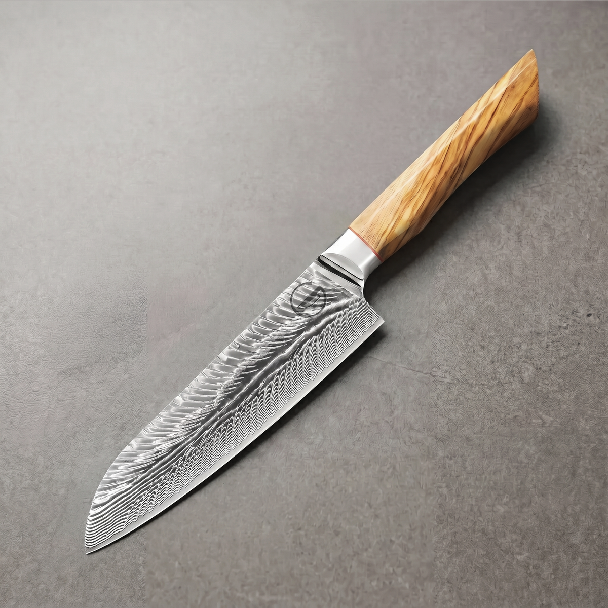 Feather Forge 7-inch santoku blade showing the feather Damascus pattern