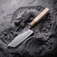 Torii 7" Nakiri detail shot — tall flat vegetable blade
