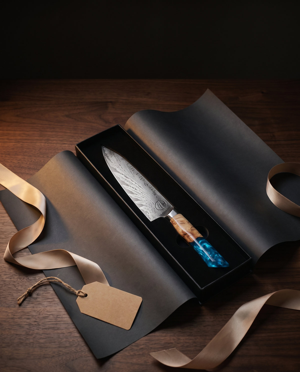Feather Forge Sapphire chef knife unboxed as a gift in its presentation box with gold ribbon